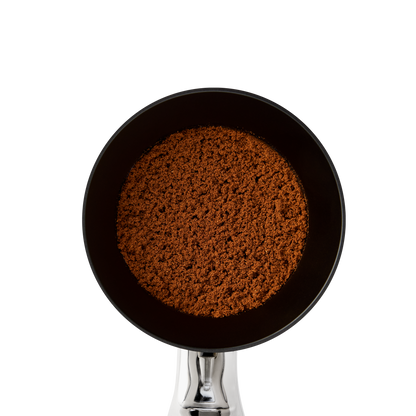 Fellow Espresso 58 mm Magnetic Dosing Funnel on a portafilter, viewed from above.
